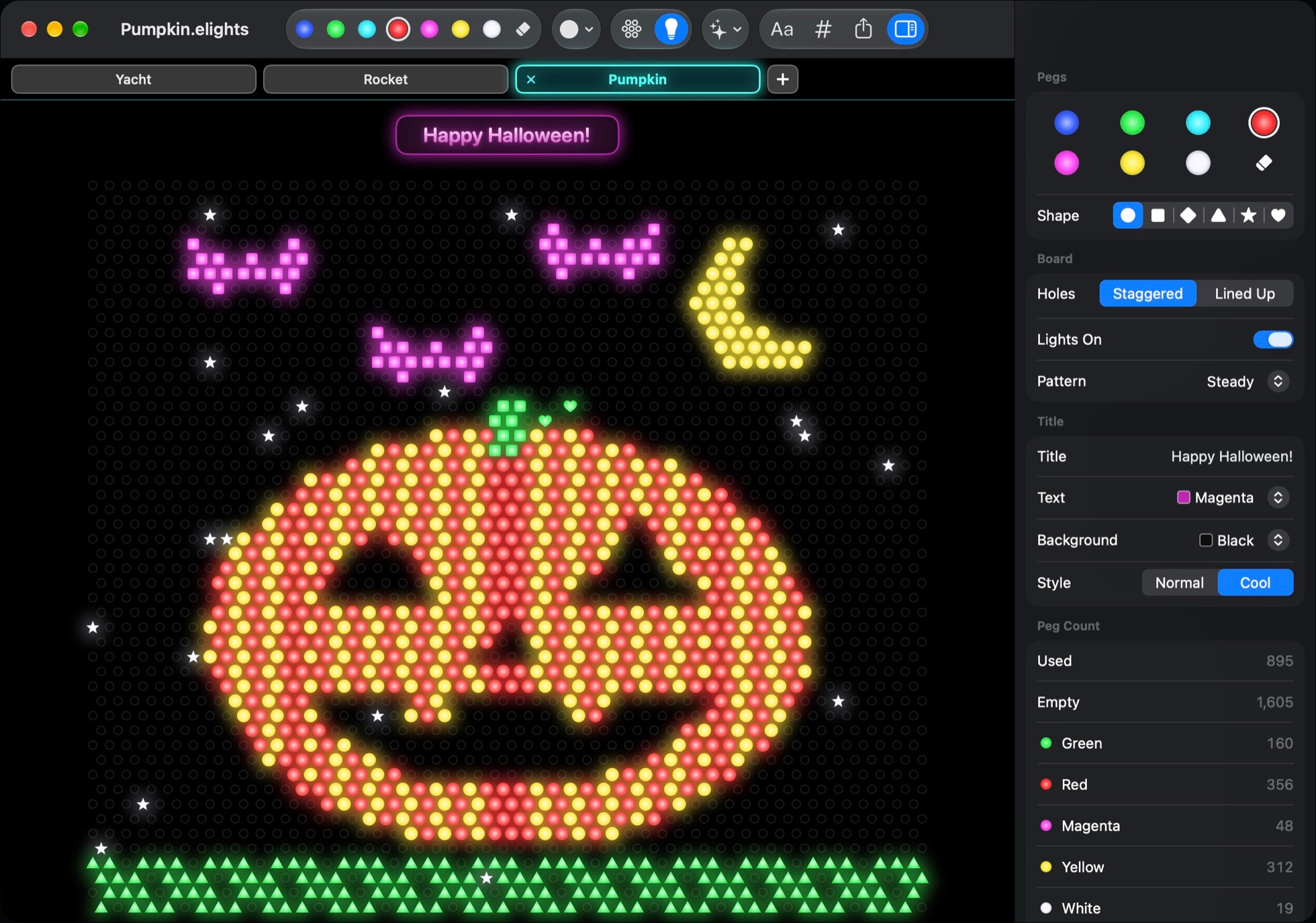 The Electric Lights window: a glowing jack-o'-lantern under a Happy Halloween sign, picture tabs for Yacht, Rocket and Pumpkin, and the Toolbox with peg colors, shapes and lighting.